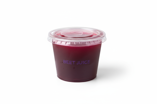 2 oz plastic condiment container with beet juice inside